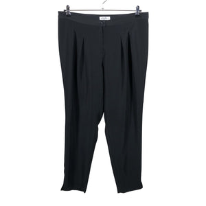 Unisex Voglia - Mittevenivad püksid, suurus 44 - Must (1)