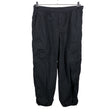 Unisex Uniqlo - Mittevenivad püksid, suurus 42 - Must ()
