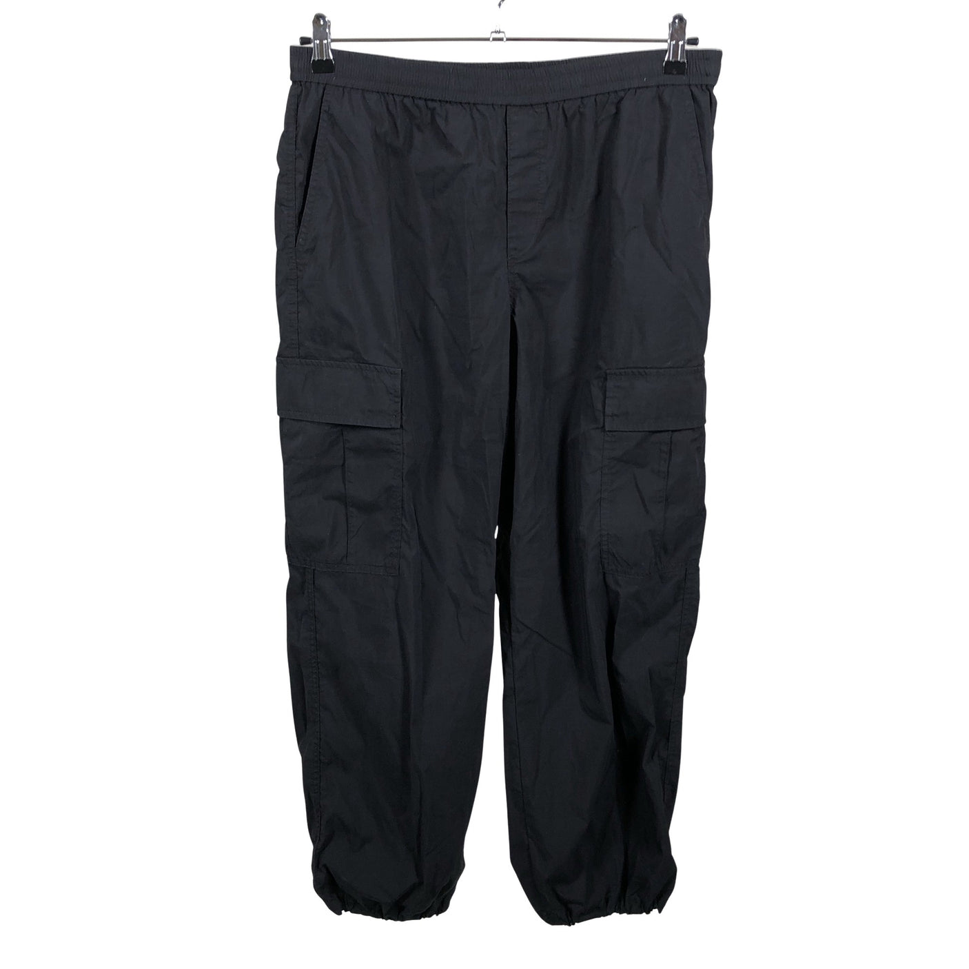 Unisex Uniqlo - Mittevenivad püksid, suurus 42 - Must (1)