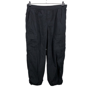 Unisex Uniqlo - Mittevenivad püksid, suurus 42 - Must (1)