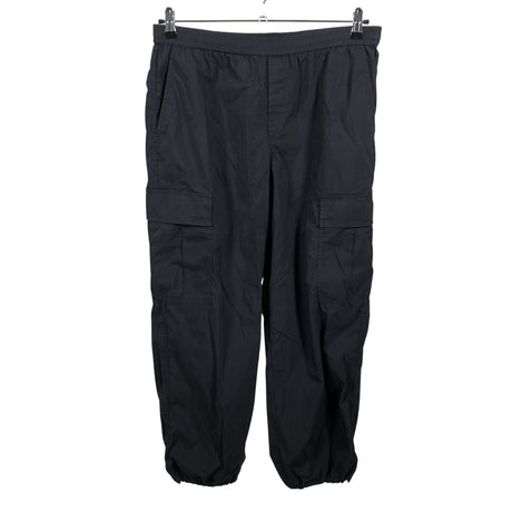 Unisex Uniqlo - Mittevenivad püksid, suurus 42 - Must ()