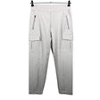 Unisex Athleta - Mittevenivad püksid, suurus 38 - Beige ()