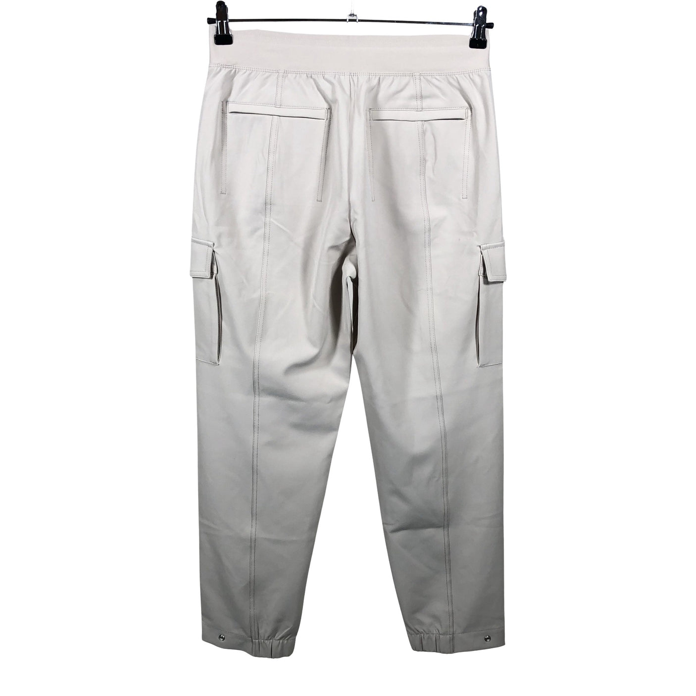 Unisex Athleta - Mittevenivad püksid, suurus 38 - Beige (2)