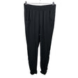 Unisex Benetton - Mittevenivad püksid, suurus 38 - Must ()