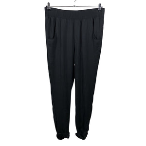 Unisex Benetton - Mittevenivad püksid, suurus 38 - Must (1)