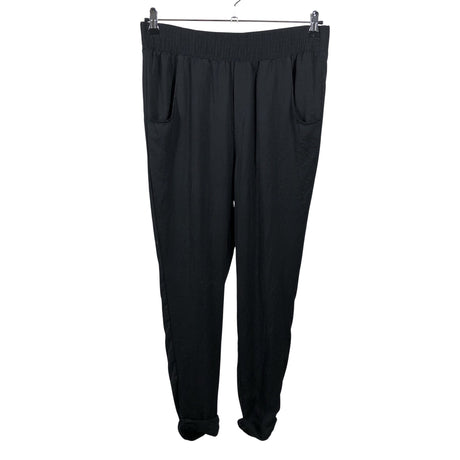 Unisex Benetton - Mittevenivad püksid, suurus 38 - Must ()