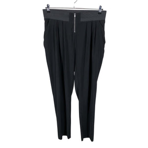 Unisex Lindex - Mittevenivad püksid, suurus 38 - Must (1)
