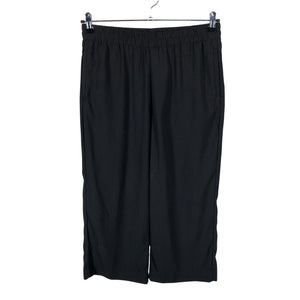 Unisex Lindex - Mittevenivad püksid, suurus 40 - Must (1)