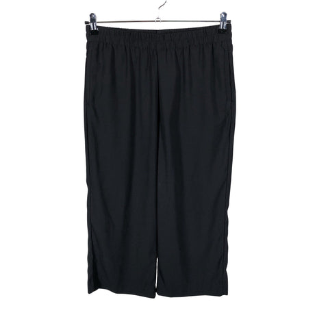 Unisex Lindex - Mittevenivad püksid, suurus 40 - Must ()