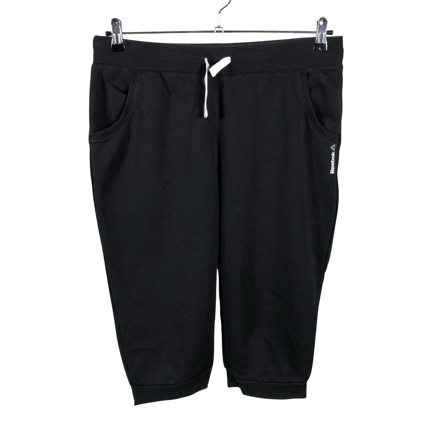 Unisex Reebok - Dressikangast poolpikad püksid, suurus 40 - Must (1)