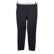 Unisex Lindex - Mittevenivad püksid, suurus 40 - Must ()