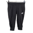 Unisex Puma - Trikotaažist poolpikad püksid, suurus 34 - Must ()