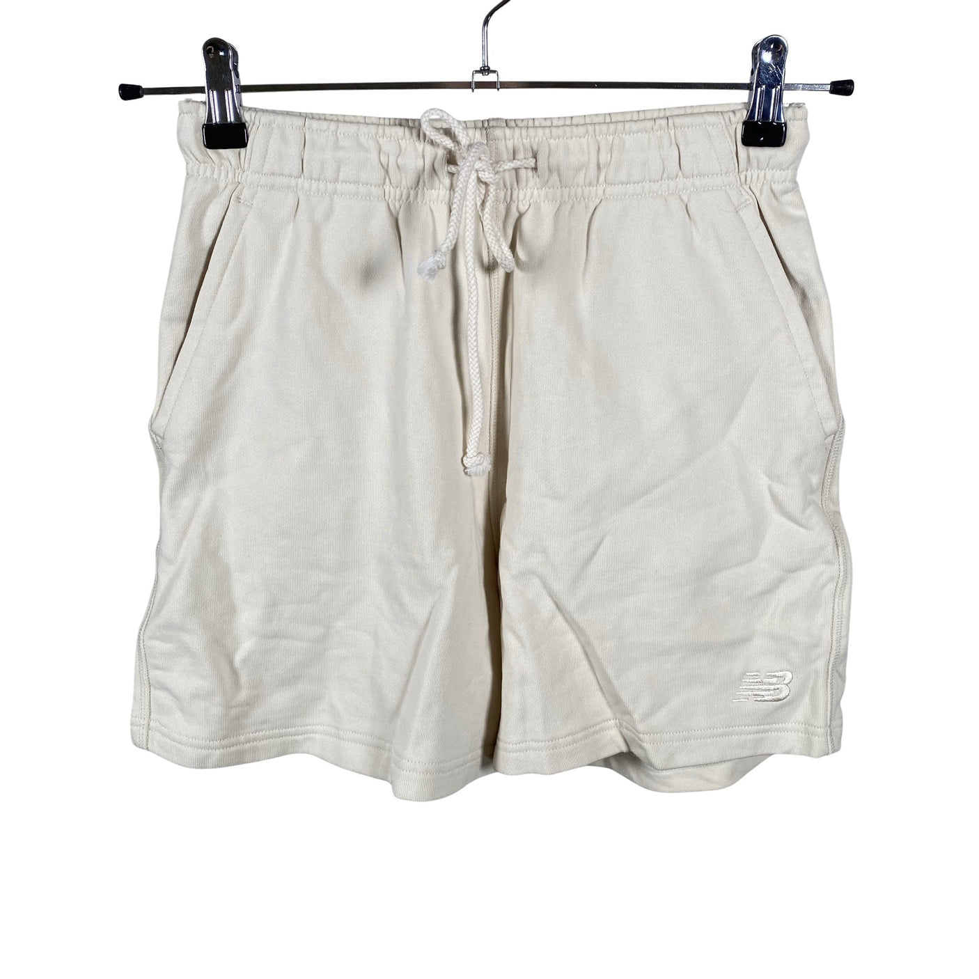 Unisex New Balance - Dressikangast lühikesed püksid, suurus 34 - Looduslik valge (1)