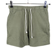 Unisex New Balance - Dressikangast lühikesed püksid, suurus 34 - Roheline ()