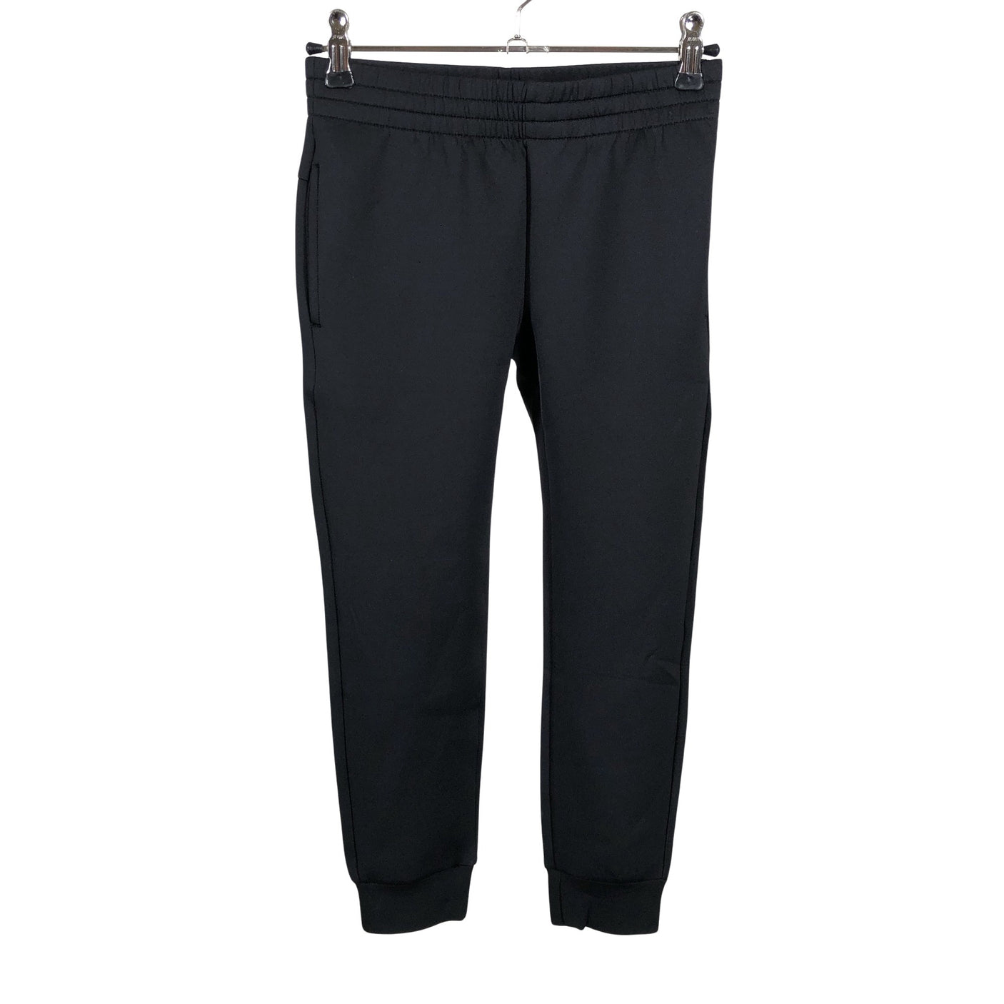 Unisex Reima - Trikotaažist püksid, suurus 116 - 122 - Must (1)