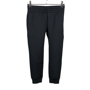 Unisex Reima - Trikotaažist püksid, suurus 116 - 122 - Must (1)