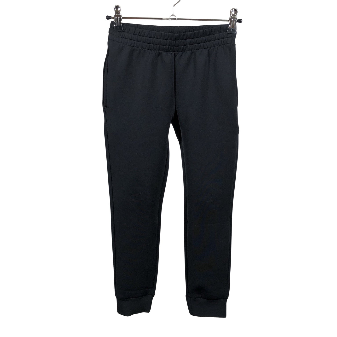 Unisex Reima - Trikotaažist püksid, suurus 116 - 122 - Must (1)