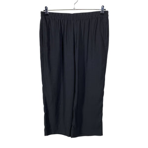 Unisex Lindex - Mittevenivad püksid, suurus 44 - Must (1)