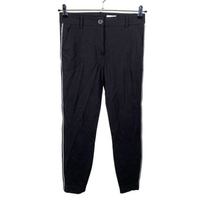 Unisex Claire.dk - Mittevenivad püksid, suurus 34 - Must (1)