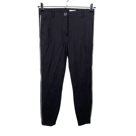 Unisex Claire.dk - Mittevenivad püksid, suurus 34 - Must ()