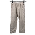 Unisex Una - Mittevenivad püksid, suurus 110 - 116 - Beige ()