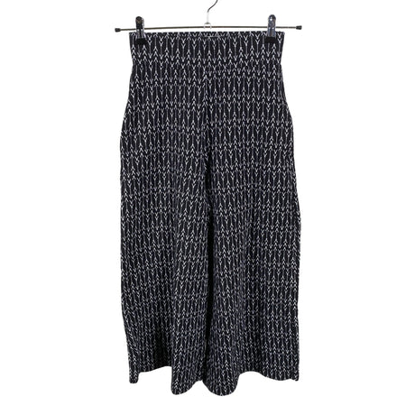 Unisex Nouki - Mittevenivad püksid, suurus 34 - Must ()