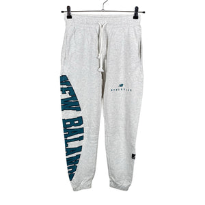 Unisex New Balance - Dressikangast püksid, suurus 34 - Hall (1)