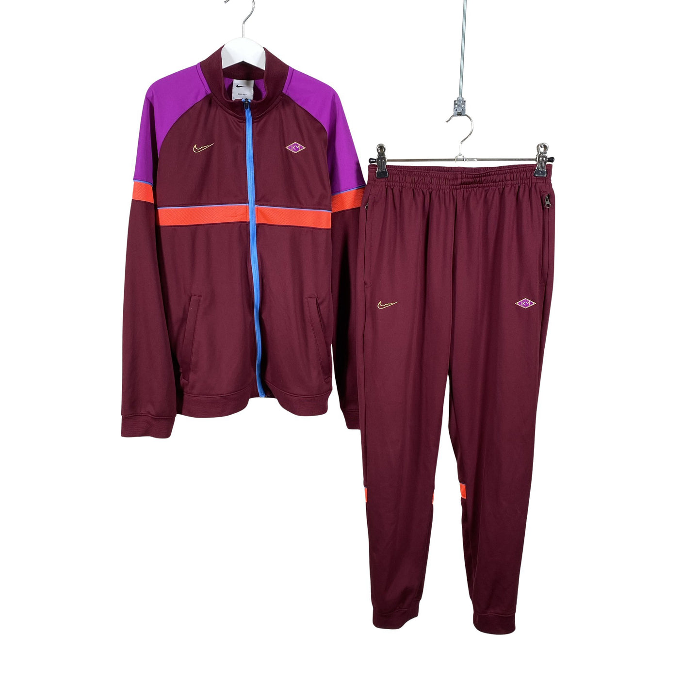 Unisex Nike - Soojenduspüksid, suurus 146 - 152 - Veinipunane (1)