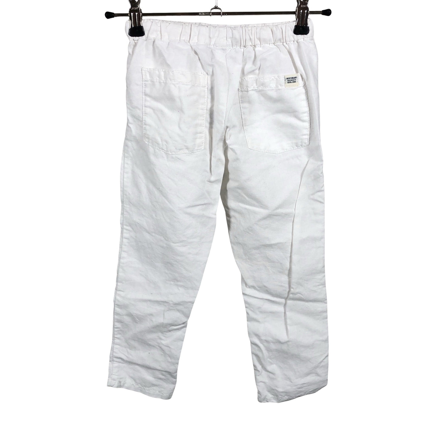Unisex Next - Mittevenivad püksid, suurus 98 - 104 - Valge (2)