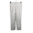 Unisex Voglia - Mittevenivad poolpikad püksid, suurus 42 - Hall ()