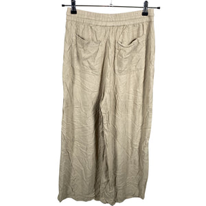 Unisex Lindex - Mittevenivad püksid, suurus 36 - Beige (2)