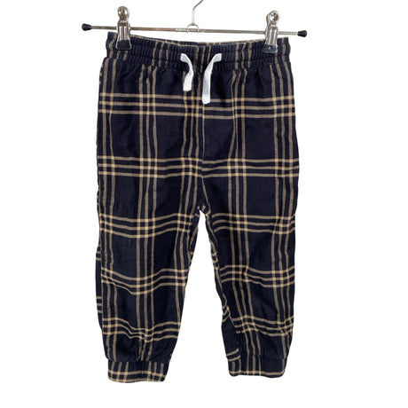 Unisex Next - Mittevenivad püksid, suurus 92 - 98 - Must ()