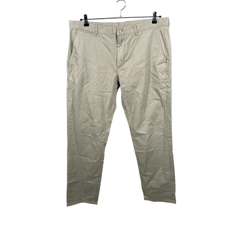 Unisex Calvin Klein - Mittevenivad püksid, suurus W38 - Beige ()
