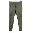 Unisex Hope - Mittevenivad püksid, suurus 38 - Roheline ()