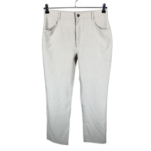 Unisex Part two - Mittevenivad püksid, suurus 42 - Beige (1)