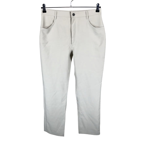 Unisex Part two - Mittevenivad püksid, suurus 42 - Beige ()