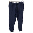 Unisex Oysho - Mittevenivad püksid, suurus 40 - Sinine ()