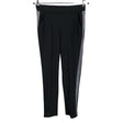 Unisex Fille a suivre - Mittevenivad püksid, suurus 36 - Must ()