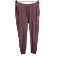 Unisex Peak Performance - Dressikangast püksid, suurus 40 - Heleroosa ()