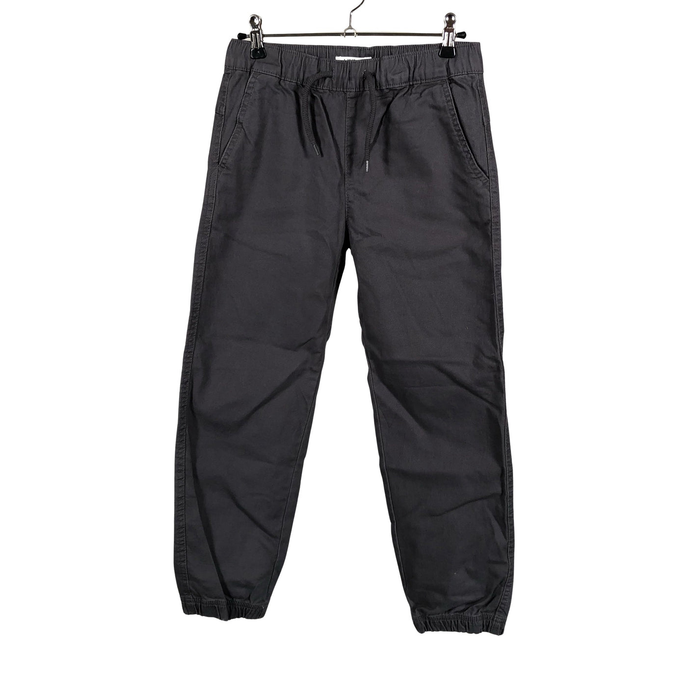 Unisex Lindex - Mittevenivad püksid, suurus 140 - 146 - Hall (1)