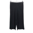 Unisex Uniqlo - Trikotaažist püksid, suurus 38 - Must ()