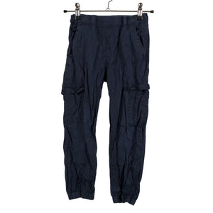 Unisex Lindex - Mittevenivad püksid, suurus 104 - 110 - Sinine (1)
