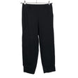 Unisex Marimekko - Mittevenivad püksid, suurus 38 - Must ()