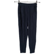 Unisex NOSH - Mittevenivad püksid, suurus 34 - Sinine ()