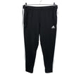 Unisex Adidas - Soojenduspüksid, suurus L - Must ()