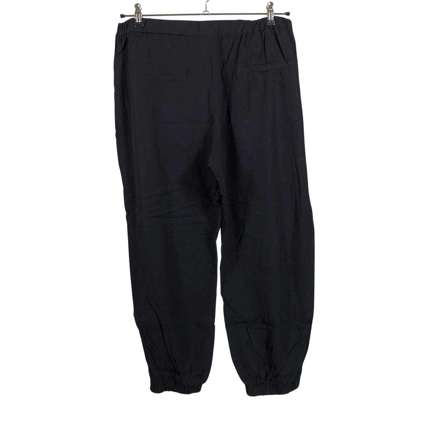 Unisex COS - Mittevenivad püksid, suurus 44 - Must (2)
