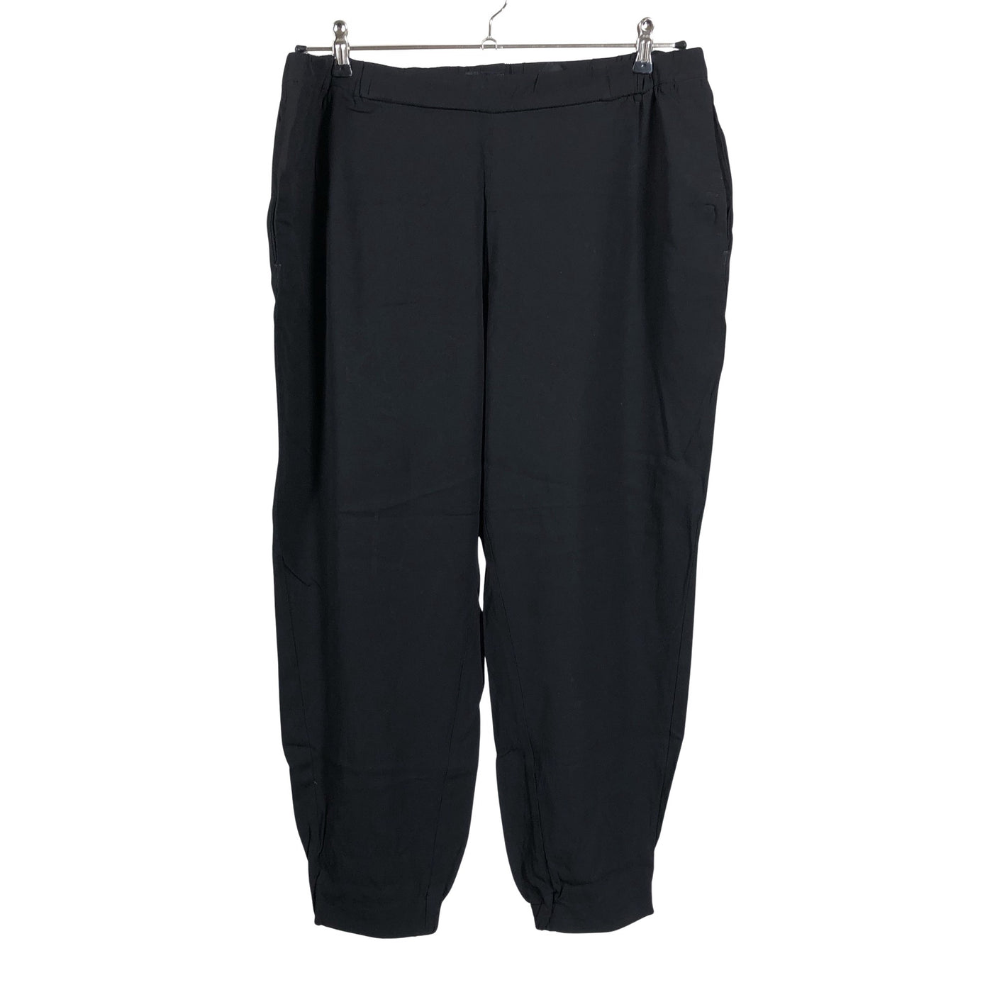 Unisex COS - Mittevenivad püksid, suurus 44 - Must (1)