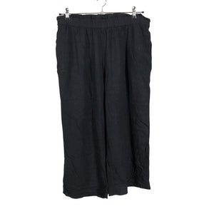 Unisex Cut & Pret - Mittevenivad püksid, suurus 48 - Must (1)