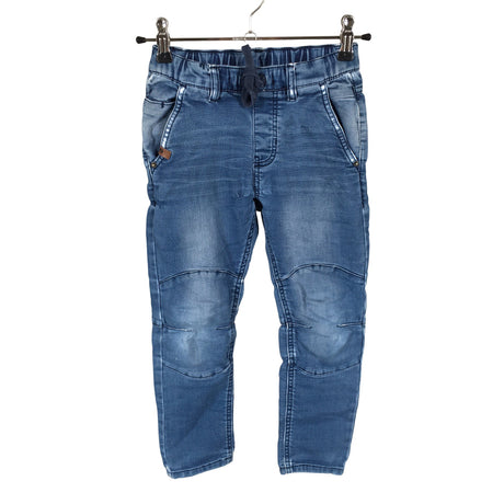 Unisex POMPdeLUX - Mittevenivad püksid, suurus 110 - 116 - Sinine ()