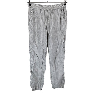 Unisex Arket - Mittevenivad püksid, suurus 38 - Beige (1)